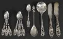 Besteckteile, 12 Stück – 800 Silber, ca. 192 g, Griffe mit reliefiertem Durchbruchdekor, u.a. Hildesheimer Rose, L= 10-14,5 cm, 8 Moccalöffel,…