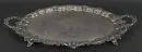 Handled tray – silver-plated metal, richly relief-decorated, on 4 curved feet, 2 handles, oval, 72.5 x 49 cm, England
