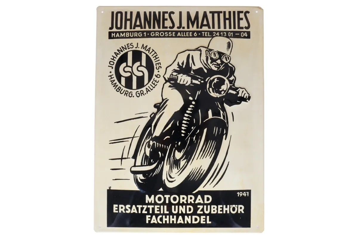 Curved and embossed advertising sign "Motorrad Matthies"