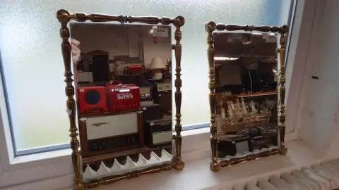 2 small brass wall mirrors