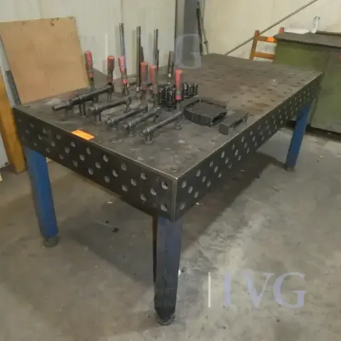 Perforated welding table