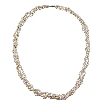 Multi-strand freshwater pearl necklace with plug clasp.