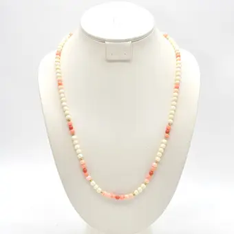 Pearl necklace made of angel skin coral, endless strand, pink and white, gold-plated beads, 20th century.