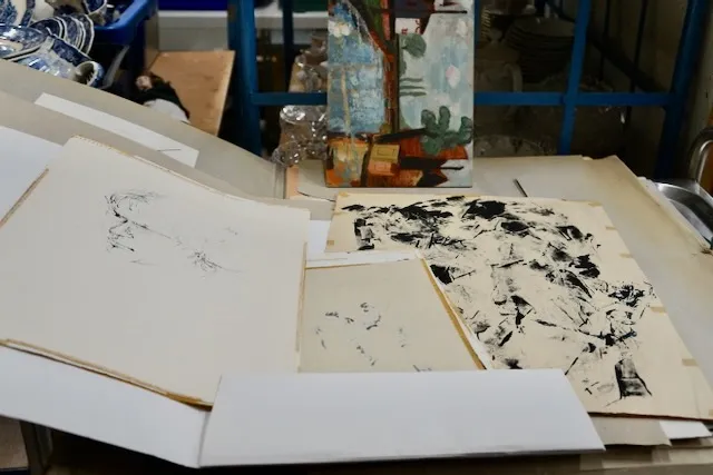 3 portfolios with art prints