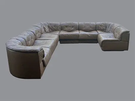 DE SEDE. 8-teiliges Modulsofa , Modell '' DS-11 '', Patchwork, Leder, Schweiz, 1970er.