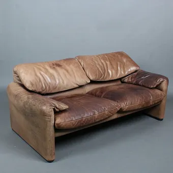 VICO MAGISTRETTI. Cassina. Zweisitzer / Couch, Modell 'Maralunga', Stahl, Leder, Entwurf 1973, Italien.
