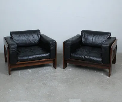 TOBIA & AFRA SCARPA. Gavina / Knoll, Paar Sessel / Lounge Chairs, Modell 'Bastiano', Esche, Leder, Entwurf 1962, Italien. (2).