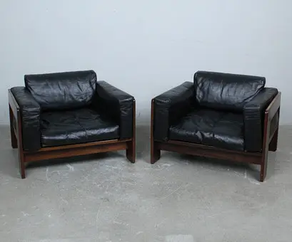 TOBIA & AFRA SCARPA. Gavina / Knoll, Paar Sessel / Lounge Chairs, Modell 'Bastiano', Esche, Leder, Entwurf 1962, Italien. (2).