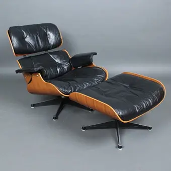 CHARLES UND RAY EAMES. für HERMAN MILLER. Sessel / Lounge Chair mit Ottomane,, Palisander, Modell 'Lounge Chair', Entwurf 1956, USA.