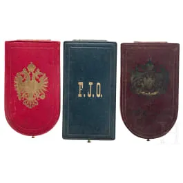 Three empty award cases, circa 1900