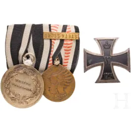 Two-part colonial medal bar and an Iron Cross 1st Class 1914