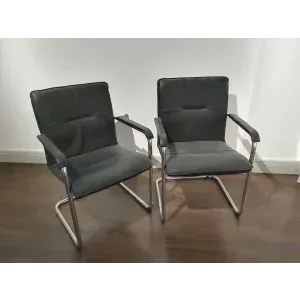 2 leather swivel chairs