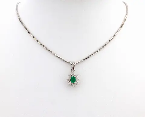 Pendentif émeraude-brillant en or 14 kt, or blanc 585/000, émeraude taille ovale env. 0,35 ct, 8