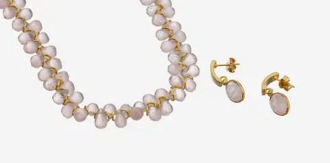Parure en quartz rose, argent 925 plaqué, comprenant : 1 collier, L. env. 50 cm, facetté
