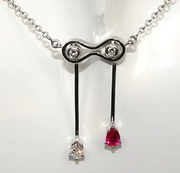 Privjesak / ogrlica zlato rubin 0,36 ct, dijamanti 0,25 ct, lanac 37 cm 585/14K 4,8 g.