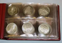Amplia colección de monedas de Alemania con primeras monedas conmemorativas, Austria, América y otras, además de hojas numismáticas en álbumes