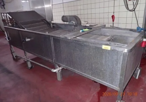 1 cocedor continuo de acero inoxidable (cocedor de gusanos), con 2 niveles de cocción, baño maría, calefacción eléctrica (defectuosa), longitud aprox. 4,00 m con control de temperatura y velocidad