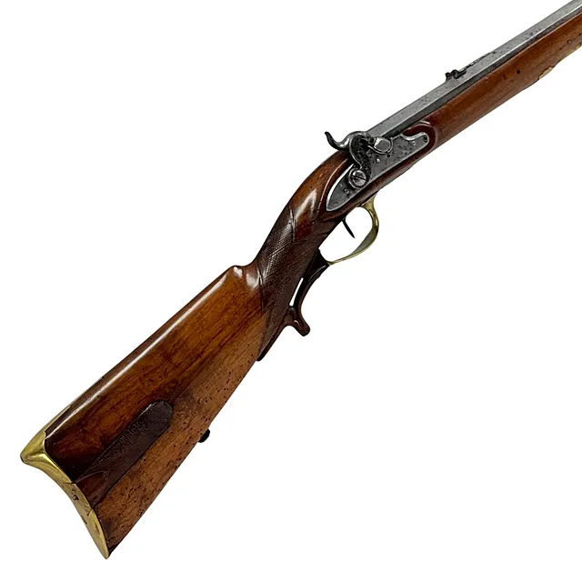 Rifle de caza con culata de mejilla tallada, llave de chispa adaptada a percusión, hacia 1750