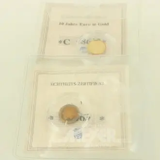 2 speciale munten in 585 goud uit abonnement
