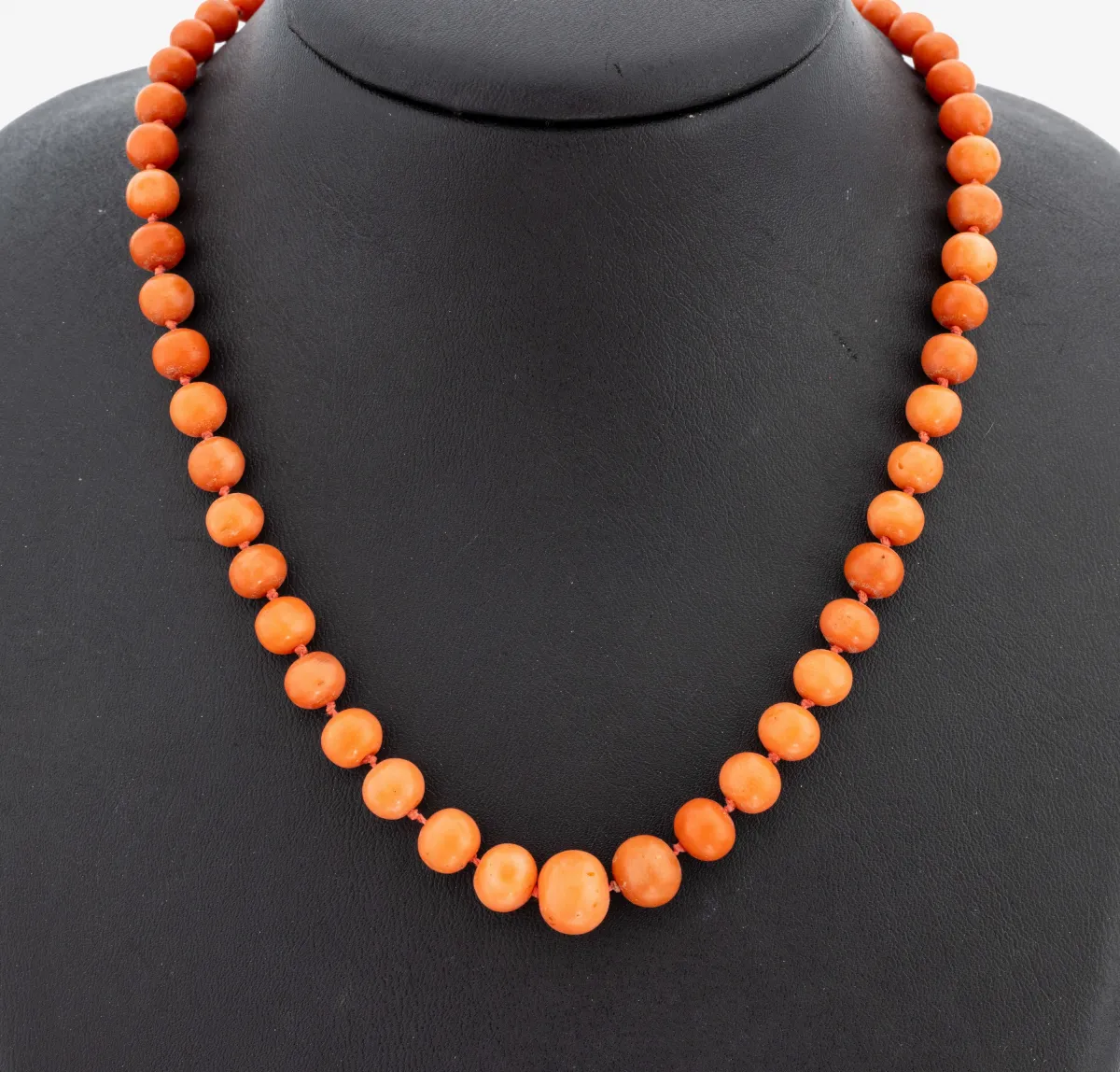 Coral necklace, Italy, circa 1900, graduated coral beads, D. approx. 4.6-10.4 mm,