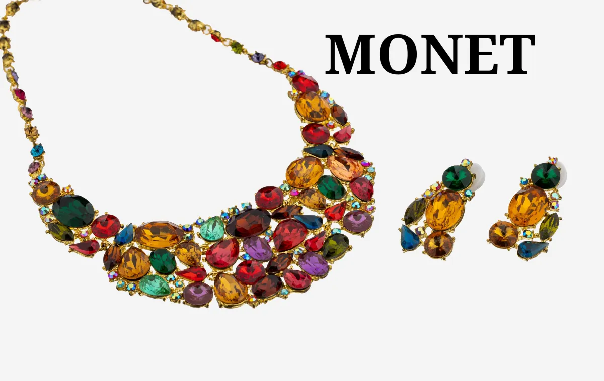 Prunkvolles MONET Modeschmuckset, USA 1970er Jahre, Metall verg., bunte Glassteine in