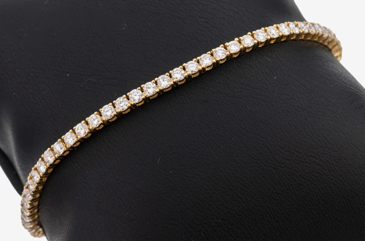 14 kt Gold Brillant-Linienarmband, GG 585/000, 68 Brillanten zus. ca. 3.50 ct