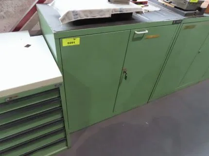 1 metal cabinet, approx. 1 m x 0.50 m x 1.0 m, 2 doors, contents: spare parts for grinding machine