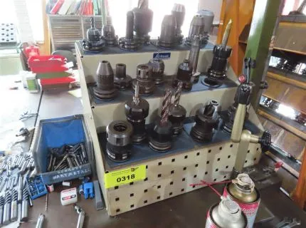 1 tool holder rack, contents: 23 tool holders