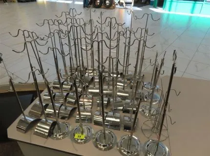 46 counter pocket stands, height-adjustable up to approx. 0.65 m, some with ESTELLE inscription, chrome frame