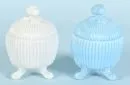Deckeldosen, 2 Stück – weißes/blaues Pressglas, auf 3 Füßen, gerillter Kugelkorpus, H= 14 cm, 1.H. 20. Jh.;