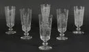 Trinkgläser, 6 Stück – farbloses Glas, konische Kelche mit aufgeätzten Motiven und Sinnsprüchen, Rundfuß, H= 17 cm;