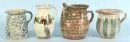 Potter's ware, 4 pieces - jugs with handle – ceramic, various shapes and decors, H= 18-23 cm, minor glaze damage, 2 with chip on rim;