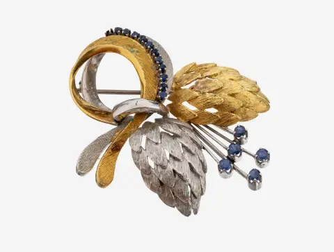 Broche saphir en or 18 kt, années 1970, or jaune/blanc 750/000, nœud stylisé avec feuilles