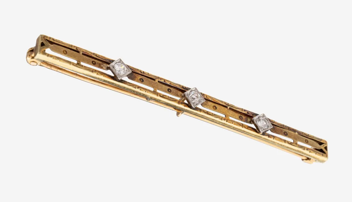 14 kt Gold Diamant-Brosche, GG/WG 585/000, ungewöhnliches Design, 1 Brillant und 2