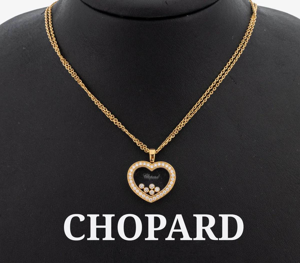 18 kt gouden CHOPARD briljant hanger, geelgoud 750/000, hart uit de Happy Diamonds serie, 5