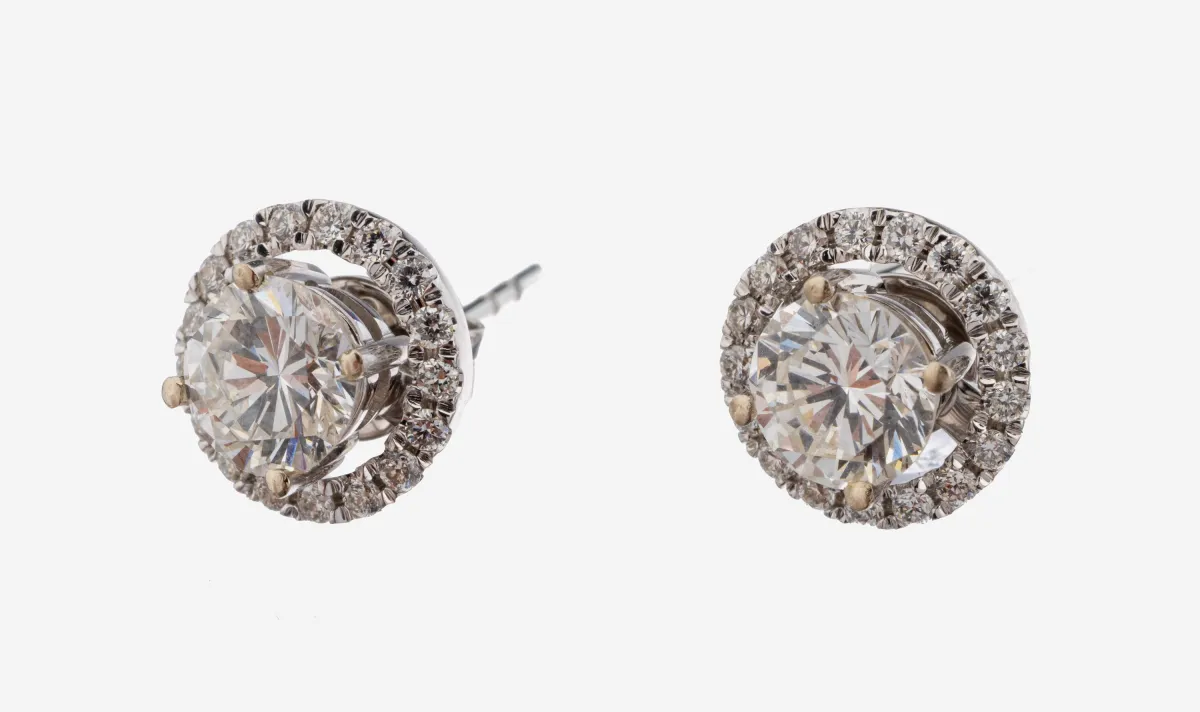 Paar 14 kt Gold Brillant-Ohrstecker, WG 585/000, 2 Brillanten zus. ca. 1.07 ct feines
