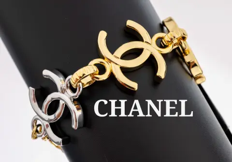 Bracelet CHANEL, métal doré ou chromé, bicolore, logos CC, signé, L. env. 15-19