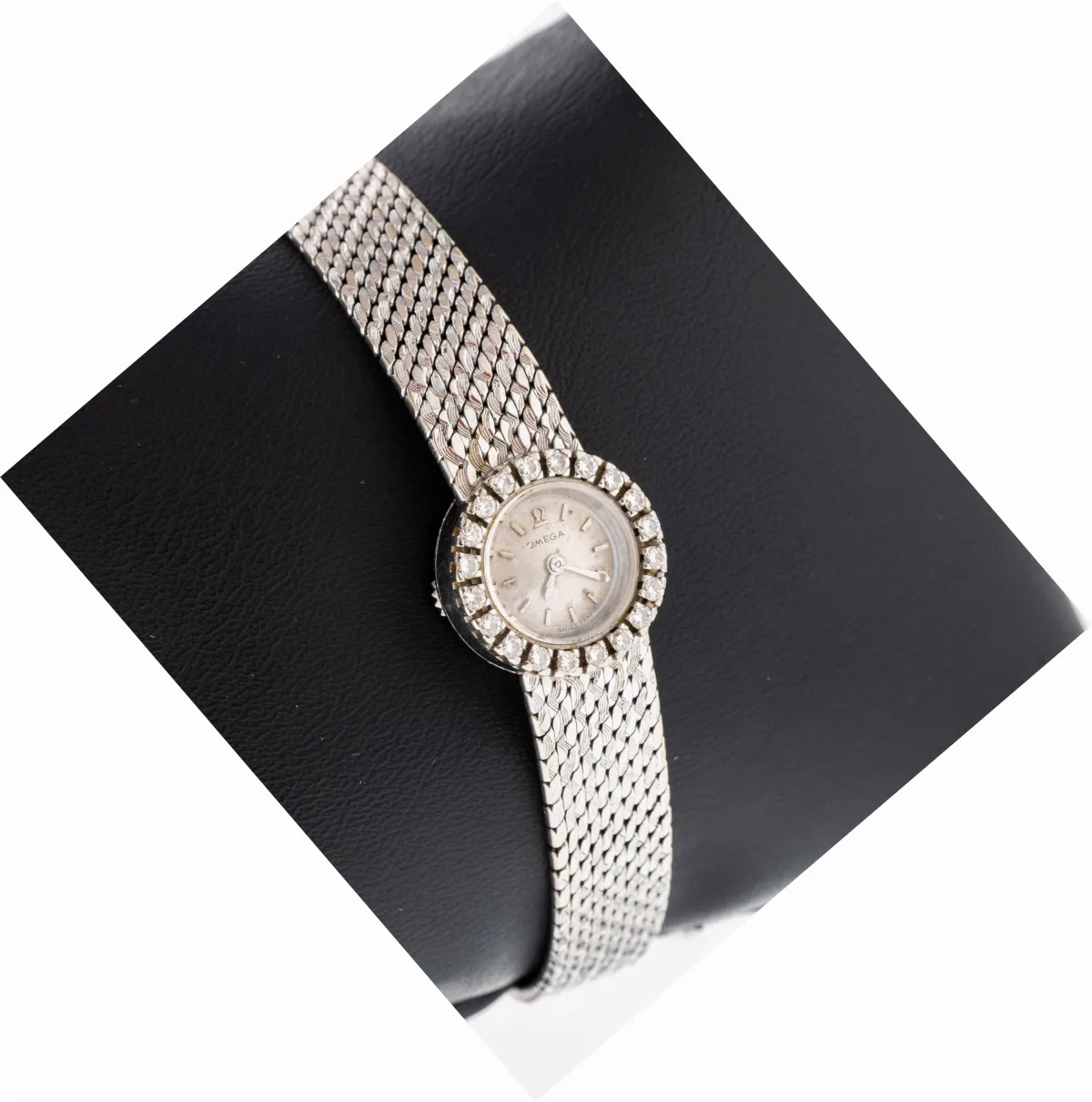 18 kt gold OMEGA diamond ladies' watch, white gold 750/000, bezel with 20 diamonds