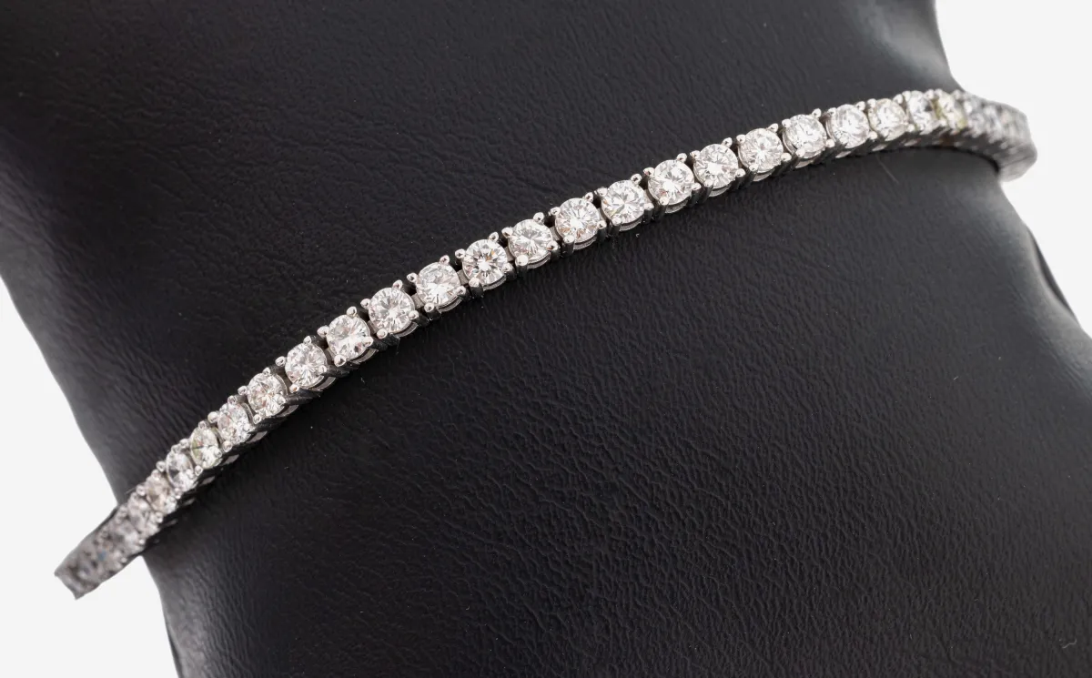 Zlatý liniový náramek s brilianty 14 kt, WG 585/000, 60 briliantů celkem cca 4.20 ct
