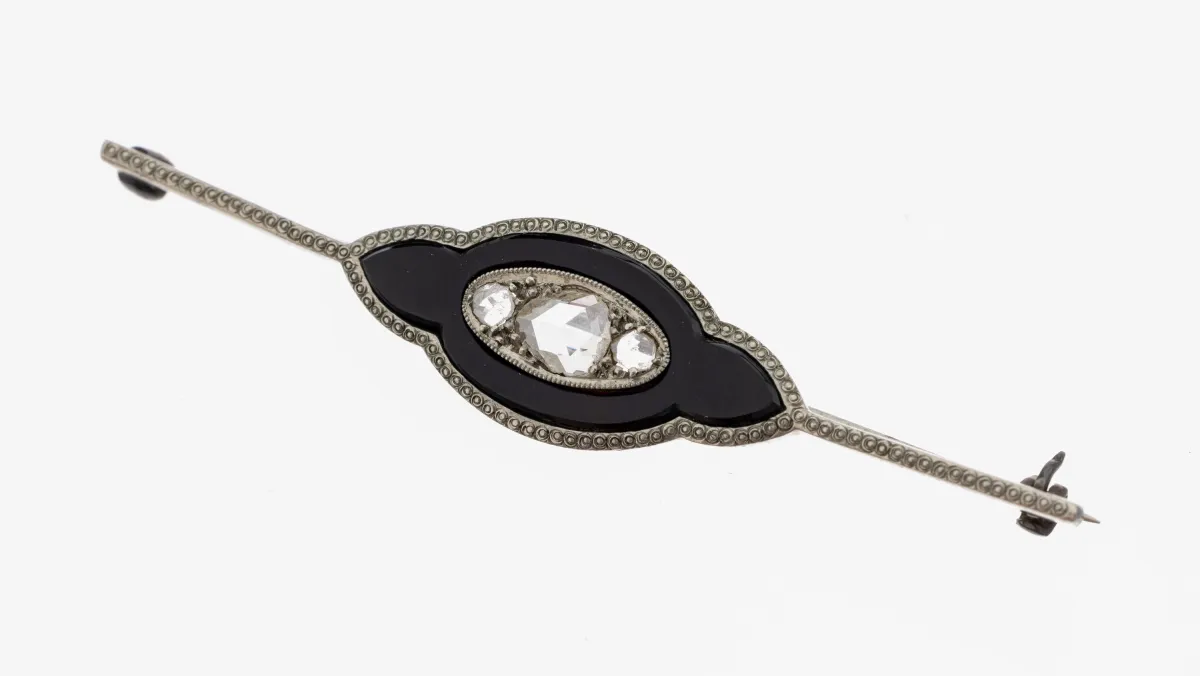 Platin Art Deco Onyx-Diamant-Brosche, 1930er Jahre, Pt gepr., Mittelteil mit Onyx-