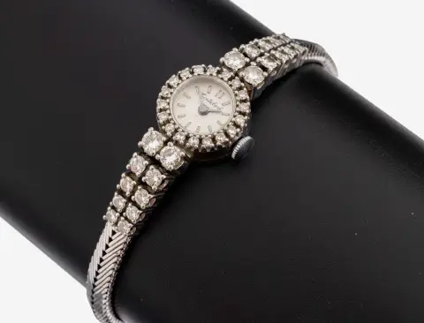 Montre-bracelet dame CORTEBERT en or 18 kt avec diamants, années 1970, or blanc 750/000, 20 brillants