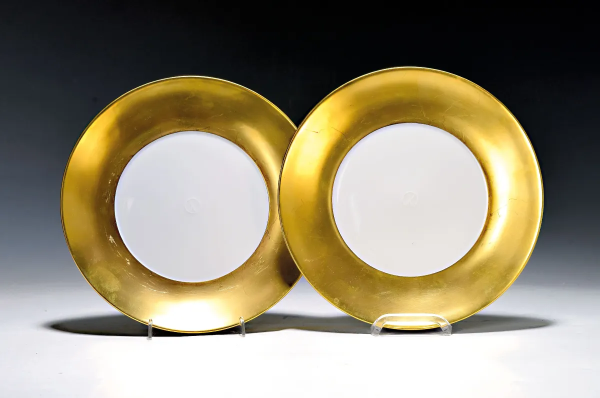 2 plates, Meissen, 20th c., porcelain, relief sword mark in centre, rim intact