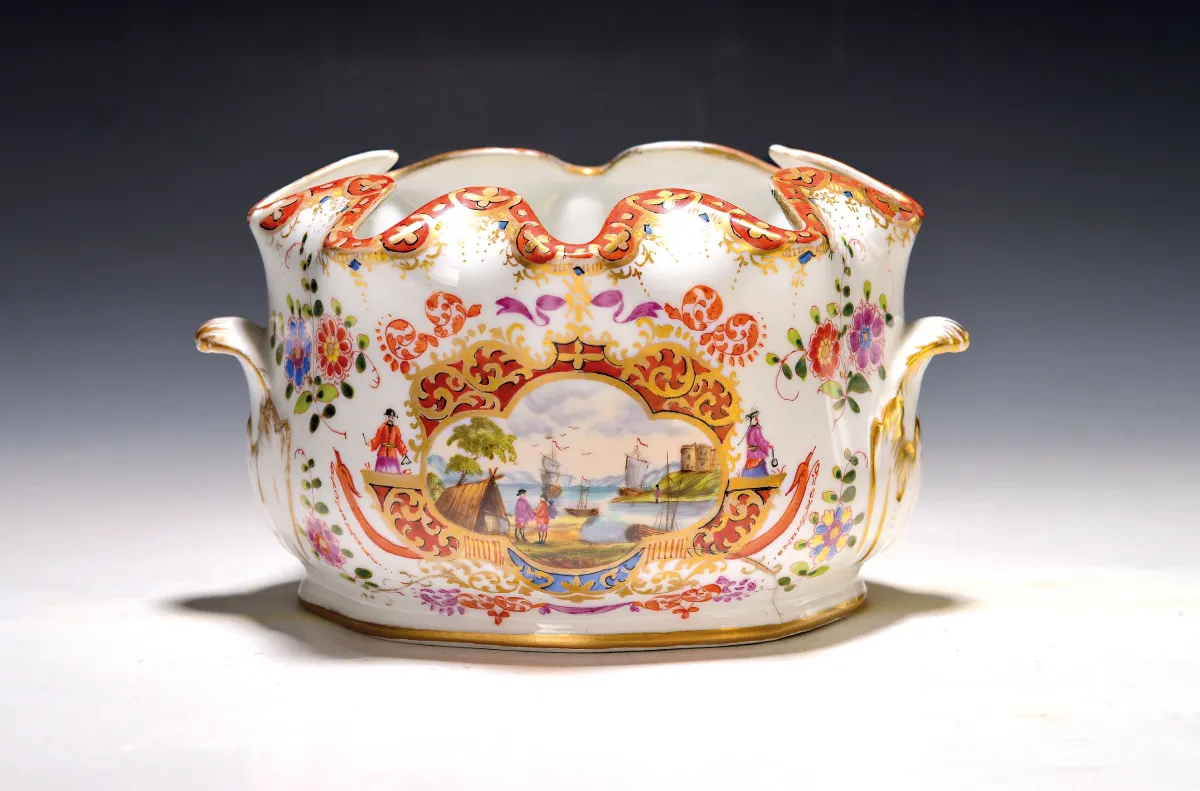 Glass cooler with maritime trade scenes, probably Meissen, 19th c., porcelain, gold decoration, two