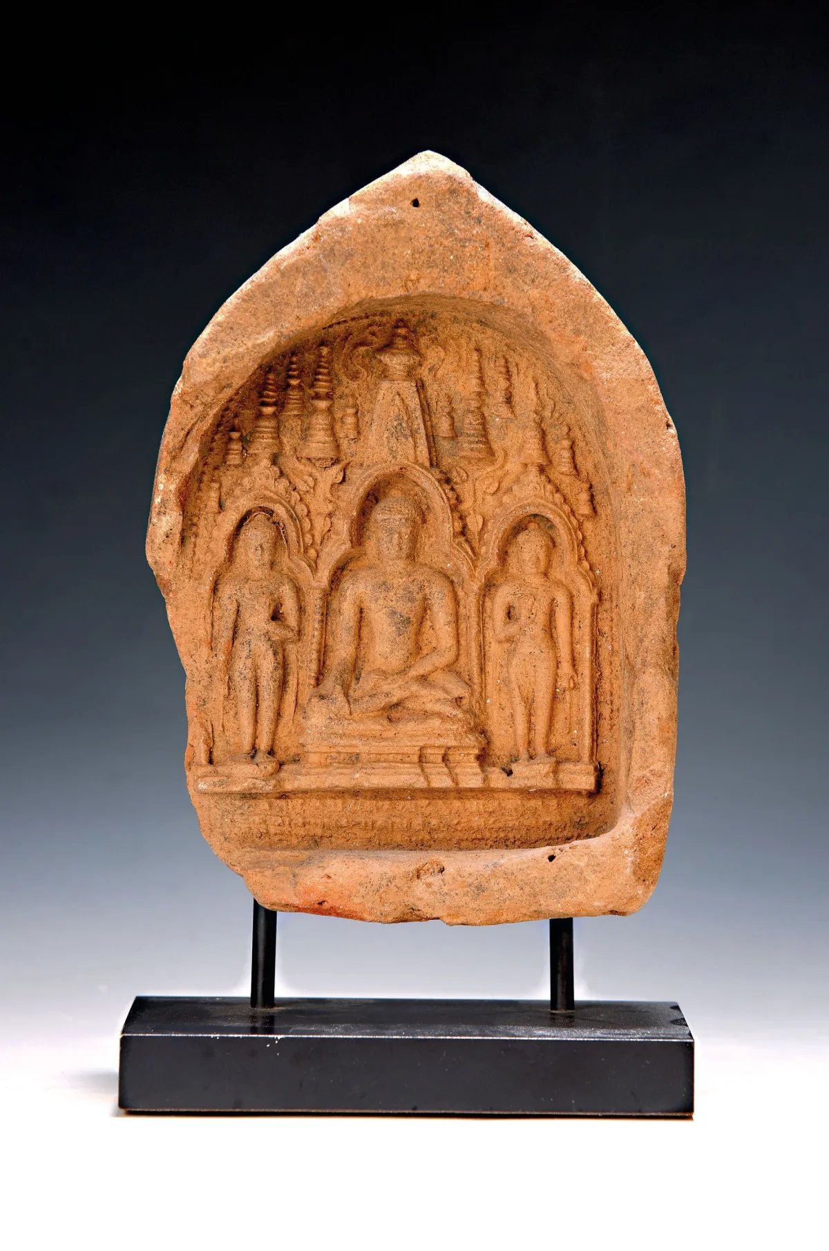 Shrine or votive plaque, Burma, 19th c., terracotta, recessed image field with central