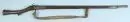 Fusil à mèche – crosse en noyer avec garnitures en fer, canon en acier rond et décoré, avec sangle, L= 160 cm, oriental, début 19e s.