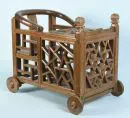 Pram – wood, brown stained, openwork decor and carved ornaments, on 4 wooden wheels, approx. 51 x 44 x 65 cm, Suzhou, China, around 1880, with certificate (copy)