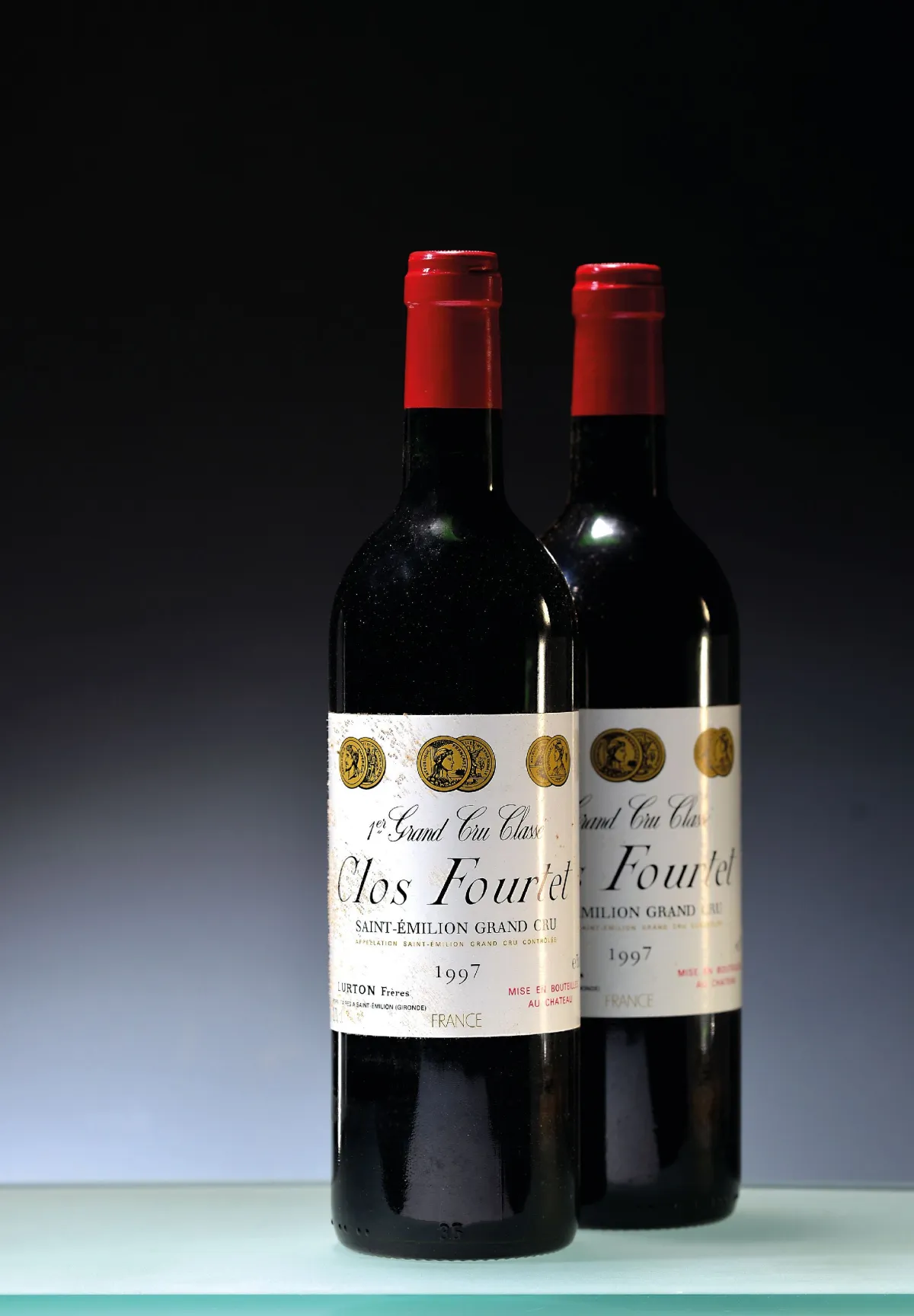 12 bouteilles 1997 Clos Fourtet, St. Emilion Grand Cru, env. 750ml, 12 bouteilles en orig.