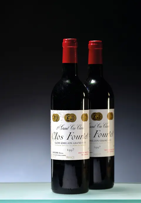 12 bouteilles 1997 Clos Fourtet, St. Emilion Grand Cru, env. 750ml, 12 bouteilles en orig.