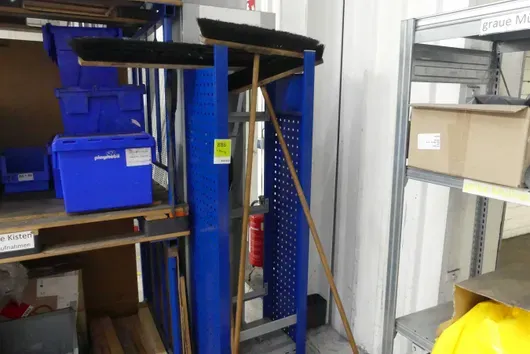 Workshop terminal with broom