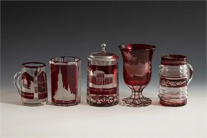 5 glasses with red stain